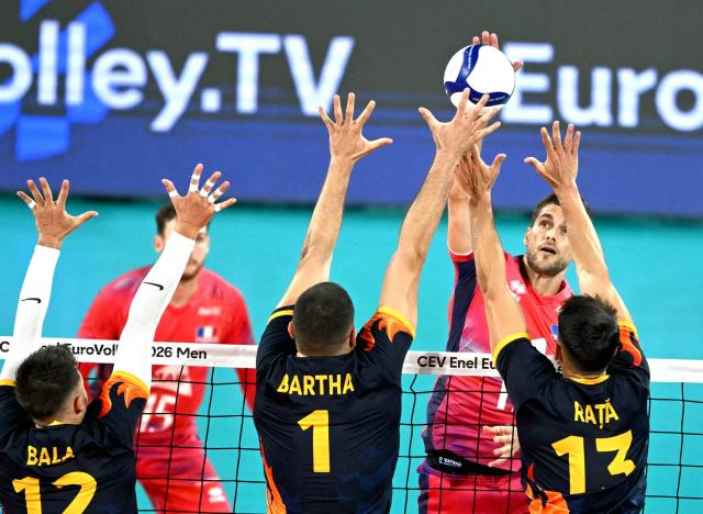 France's outside hitter Trevor Clevenot (up) smashes during the Eurovolley 2026 quarter-final volleyball match between France and Romania in Sofia on September 22, 2026. (Photo by Nikolay DOYCHINOV / AFP)