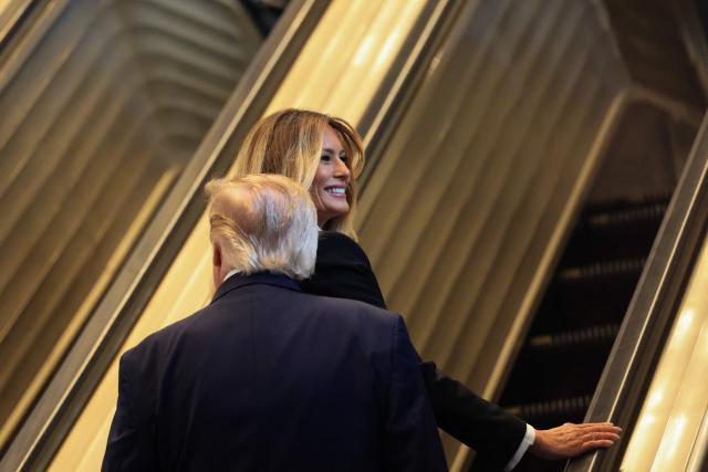 US President Donald Trump and First Lady Melania Trump ride an escalator as they arrive during the 81st United Nations General Assembly at the United Nations Headquarters in New York, on September 22, 2026. (Photo by CHARLY TRIBALLEAU / AFP)