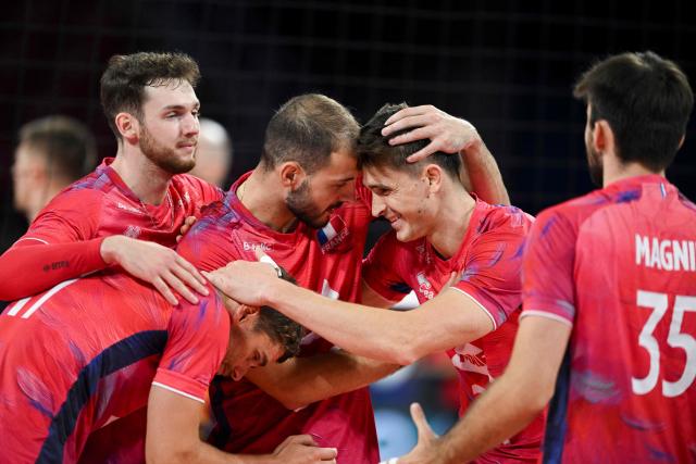 France's opposite Theo Faure and teammates celebrate their victory at the end of the Men's EuroVolley 2026 quarter-final volleyball match between France and Romania at Arena 8888 in Sofia on September 22, 2026. (Photo by Nikolay Doychinov / AFP)