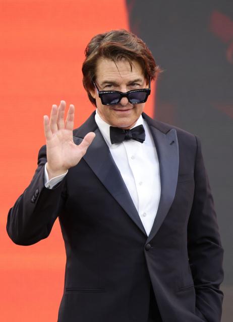 US actor Tom Cruise poses upon arrival for the global premiere of the film 'Digger' in Leicester Square in central London on September 22, 2026. (Photo by Henry NICHOLLS / AFP)