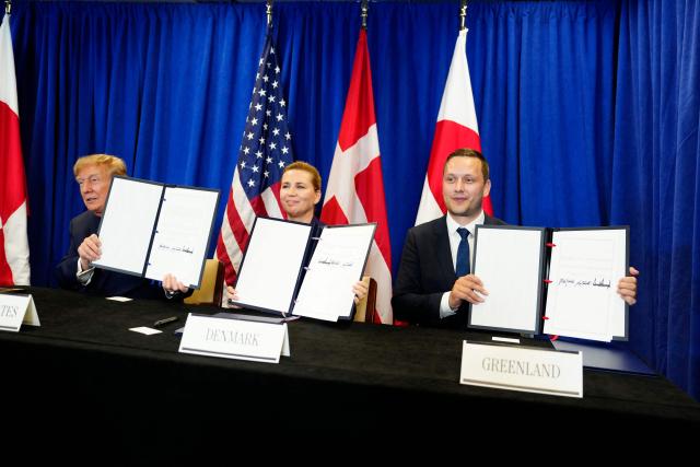 (L-R) US President Donald Trump, Denmark's Prime Minister Mette Frederiksen and Greenland's Prime Minister Jens-Frederik Nielsen pose after they signed a trilateral security deal on the sidelines of the 81st United Nations General Assembly in New York, on September 22, 2026. (Photo by Mads Claus Rasmussen / Ritzau Scanpix / AFP) / Denmark OUT