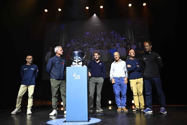 (From L) French skipper Erwan Le Roux, French skipper Sidney Gavignet, French sailor Charles Caudrelier, "Oceans" Vintage Multihull Class French sailor Francis Joyon, "Les P'tits Doudous" IMOCA Class French sailor Armel Tripon and Sodebo Ultim 3 French sailor Thomas Coville attend the press conference of the 13th Route du Rhum on September 22, 2026, at the Folies Bergere theatre in Paris. From Saint-Malo in Brittany to Pointe-à-Pitre in Guadeloupe, 118 skippers across 6 classes will take the start on November 1, 2026, in this solo transatlantic sailing race. (Photo by JULIEN DE ROSA / AFP)