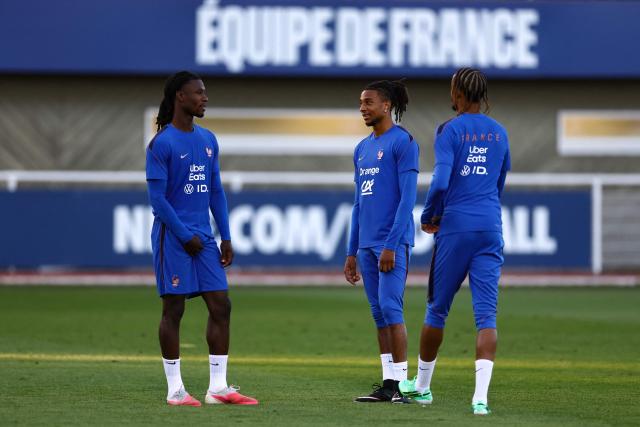 France's midfielder Eduardo Camavinga (L), France's forward Michael Olise and France's forward Bradley Barcola attend a training session at the national team training grounds in Clairefontaine-en-Yvelines, southwest of Paris, on September 22, 2026, as part of the preparation for the upcoming UEFA Nations League football match against Turkey. (Photo by FRANCK FIFE / AFP)
