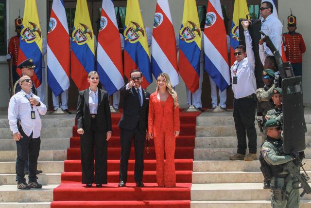 Costa Rica's president Laura Fernandez (L) is welcomed by Colombia's President Abelardo de la Espriella and his wife Ana Lucia Pineda upon her arrival in Barranquilla, Colombia on September 22, 2026. (Photo by Jose TORRES / AFP)
