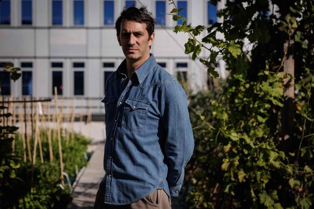 Co-founder of urban farming operation and restaurant "Ma Salade à Toit" Gregory Schepard poses during a photo session at his company on the rooftop of the Arcades shopping centre in Noisy-le-Grand, in the eastern suburbs of Paris on September 22, 2026. (Photo by Simon WOHLFAHRT / AFP)
