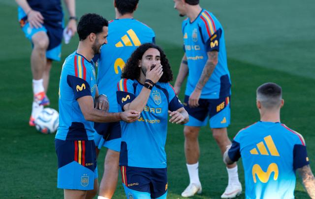 Spain's defender Marc Cucurella (C) gestures during a training session ahead of Spain's UEFA Nations League football match against England at the Ciudad del Futbol in Las Rozas, outside Madrid, on September 22, 2026. (Photo by Oscar DEL POZO / AFP)
