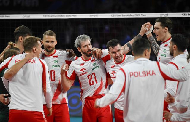 Poland’s Tomasz Fornal (C) celebrates with teammates after winning the CEV EuroVolley 2026 men's volleyball quarterfinal match against Germany at Arena 8888 in Sofia on September 22, 2026. (Photo by Nikolay Doychinov / AFP)