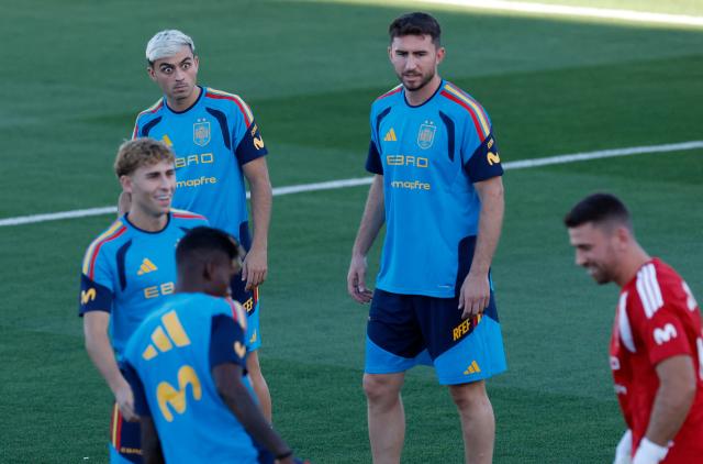 Spain's midfielder Pedri (L) looks on during a training session ahead of Spain's UEFA Nations League football match against England at the Ciudad del Futbol in Las Rozas, outside Madrid, on September 22, 2026. (Photo by Oscar DEL POZO / AFP)