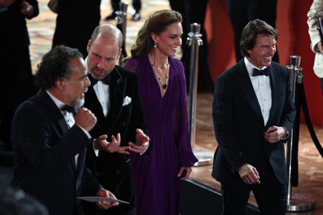 Mexican filmmaker Alejandro Gonzalez Inarritu (L) and US actor Tom Cruise (R) speak with Britain's Prince William, Prince of Wales and Britain's Catherine, Princess of Wales as they arrive for the global premiere of the film 'Digger' in Leicester Square in central London on September 22, 2026. (Photo by Henry NICHOLLS / AFP)