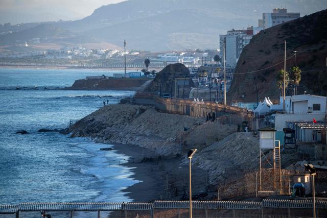 A picture taken on September 22, 2026 shows a view of the Tarajal border crossing between Morocco and the Spanish enclave of Ceuta, following social media calls for mass attempts to cross into Ceuta from Morocco. Under pressure to contain migration after a crisis in Ceuta on July 30 and 31, Spain's government had insisted that no irregular migrants would be allowed to reach the mainland. On those days more than 70,000 migrants streamed into Ceuta from Morocco in an unprecedented, chaotic surge that left scores dead and sparked European Union infighting over the sensitive topic of immigration. (Photo by Antonio Sempere / AFP)