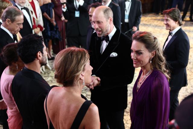 Britain's Prince William, Prince of Wales and Britain's Catherine, Princess of Wales speak with members of the cast as they arrive for the global premiere of the film 'Digger' in Leicester Square in central London on September 22, 2026. (Photo by Henry Nicholls / AFP)