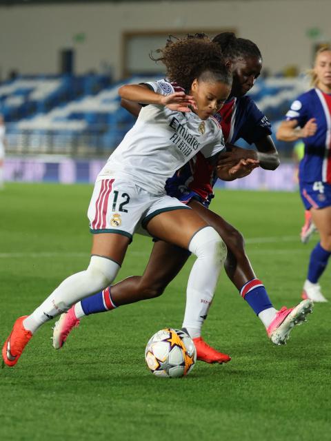 Real Madrid's Swedish forward #12 Felicia Schroder fights for the ball Paris Saint-Germain's French defender #02 Thiniba Samoura during the UEFA Women's Champions League, league phase day 1 football match between Real Madrid CF and Paris Saint-Germain (PSG) at the Alfredo Di Stefano stadium in Madrid, on September 22, 2026. (Photo by Thomas COEX / AFP)
