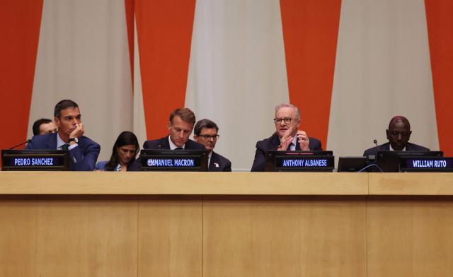 (From L) Spain’s Prime Minister Pedro Sбnchez, France's President Emmanuel Macron, Australia's Prime Minister Anthony Albanese and Kenya's President William Ruto participate in the Coalition for the Rights and Protection of Children in the Age of Artificial Intelligence session on the sidelines of the 81st United Nations General Assembly at United Nations Headquarters in New York on September 22, 2026. (Photo by Ludovic MARIN / AFP)