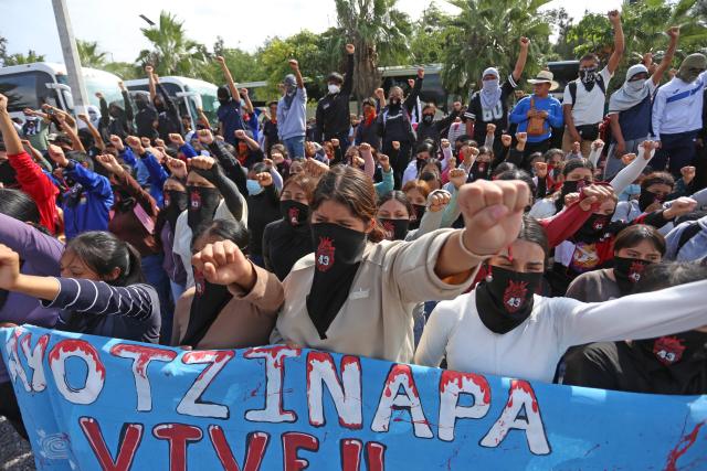 Demonstrators protest ahead of the 12th anniversary of the disappearance of the 43 Ayotzinapa students in Chilpancingo, Guerrero state, Mexico, on September 22, 2026. The 43 students from a teachers' college disappeared on September 26, 2014, while traveling by bus through the state of Guerrero to take part in a demonstration in Mexico City. (Photo by Eduardo Guerrero / AFP)