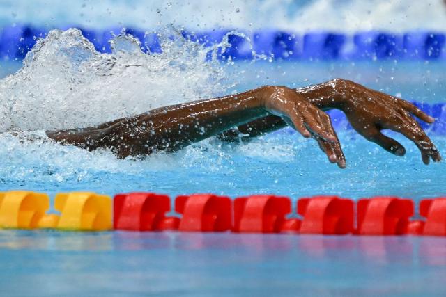 India's Benediction Rohit Beniston Manickaraj competes in a heat of the men's 100m butterfly swimming event during the 2026 Asian Games at the Tokyo Aquatics Centre in Tokyo on September 23, 2026. (Photo by ANDREW CABALLERO-REYNOLDS / AFP)