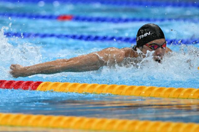 Japan's Katsuhiro Matsumoto competes in a heat of the men's 100m butterfly swimming event during the 2026 Asian Games at the Tokyo Aquatics Centre in Tokyo on September 23, 2026. (Photo by ANDREW CABALLERO-REYNOLDS / AFP)
