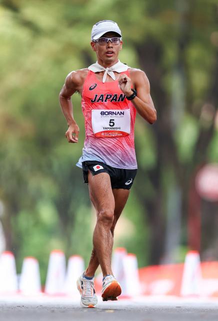 Japan's Toshikazu Yamanishi competes in the men's half marathon race walk at the 2026 Asian Games in Nagoya on September 23, 2026. (Photo by JIJI PRESS / AFP) / Japan OUT