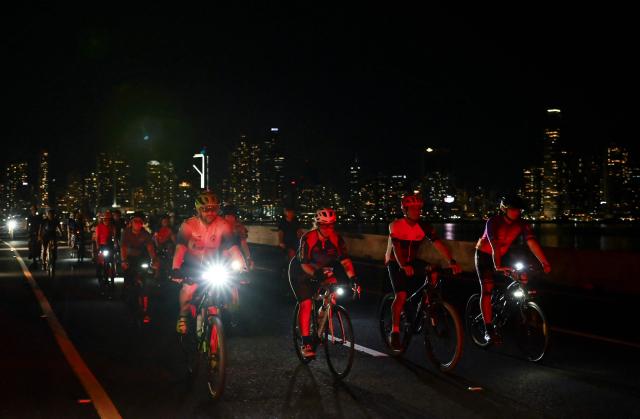 Cyclists take part in a ride along the Cinta Costera to mark World Car-Free Day in Panama City on September 22, 2026. (Photo by MARTIN BERNETTI / AFP)
