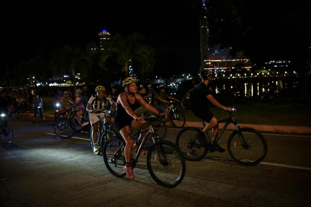 Cyclists take part in a ride along the Cinta Costera to mark World Car-Free Day in Panama City on September 22, 2026. (Photo by MARTIN BERNETTI / AFP)