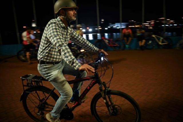 Cyclists take part in a ride along the Cinta Costera to mark World Car-Free Day in Panama City on September 22, 2026. (Photo by MARTIN BERNETTI / AFP)