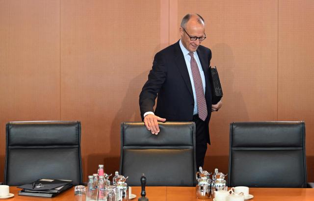 German Chancellor Friedrich Merz arrives for a weekly meeting of the German cabinet at the Chancellery in Berlin, on September 23, 2026. (Photo by John MACDOUGALL / AFP)