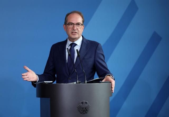 German Interior Minister Alexander Dobrindt addresses a press conference 
on an action plan against social benefit fraud at the Interior Ministry in Berlin on September 23, 2026. (Photo by Odd ANDERSEN / AFP)