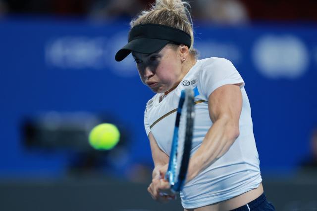 Kazakhstan’s Yulia Putintseva hits a return to Spain’s Christina Bucsa during their women’s singles quarter-final match at the Billie Jean King Cup tennis tournament in Shenzhen, in China’s southern Guangdong province on September 23, 2026. (Photo by CN-STR / AFP) / China OUT