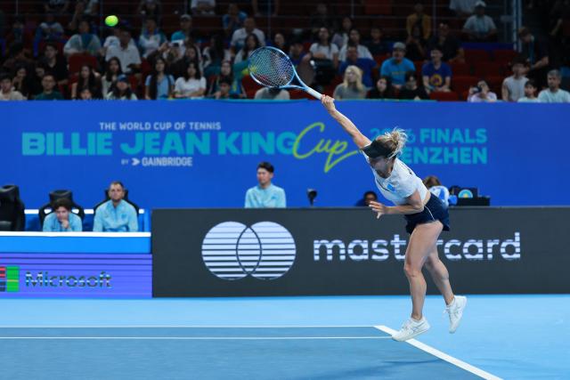 Kazakhstan’s Yulia Putintseva serves to Spain’s Christina Bucsa during their women’s singles quarter-final match at the Billie Jean King Cup tennis tournament in Shenzhen, in China’s southern Guangdong province on September 23, 2026. (Photo by CN-STR / AFP) / China OUT