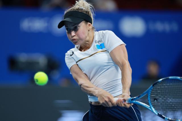 Kazakhstan’s Yulia Putintseva hits a return to Spain’s Christina Bucsa during their women’s singles quarter-final match at the Billie Jean King Cup tennis tournament in Shenzhen, in China’s southern Guangdong province on September 23, 2026. (Photo by CN-STR / AFP) / China OUT