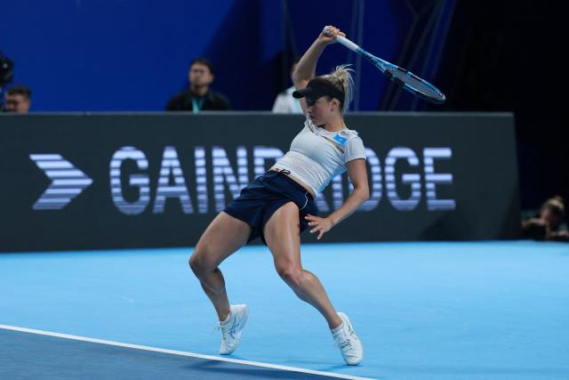 Kazakhstan’s Yulia Putintseva hits a return to Spain’s Christina Bucsa during their women’s singles quarter-final match at the Billie Jean King Cup tennis tournament in Shenzhen, in China’s southern Guangdong province on September 23, 2026. (Photo by CN-STR / AFP) / China OUT