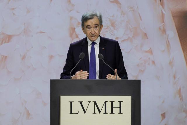 (FILES) LVMH chairman and CEO Bernard Arnault delivers a speech during the annual general meeting of the world's leading luxury group LVMH at the Carrousel du Louvre in Paris on April 23, 2026. The Arnault family-owned group intends to streamline the structure that controls the global luxury giant LVMH through a series of mergers and reorganisations, Christian Dior announced in a press release on September 23, 2026. (Photo by Ludovic MARIN / AFP)