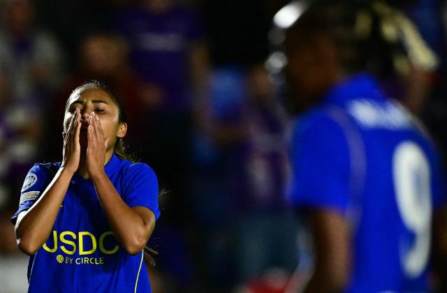 Chelsea's US midfielder #12 Alyssa Thompson (L) reacts after a missed opportunity during the UEFA Women's Champions League football match between Chelsea and Austria Wien at the Cherry Red Records Stadium in Wimbledon, south-west London on September 23, 2026. (Photo by Ben STANSALL / AFP)