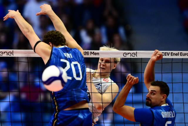 Finland’s Luka Marttila spikes the ball during the CEV EuroVolley 2026 men's quarterfinal volleyball match between Italy and Finland at the Palavela in Turin on September 23, 2026. (Photo by Marco BERTORELLO / AFP)