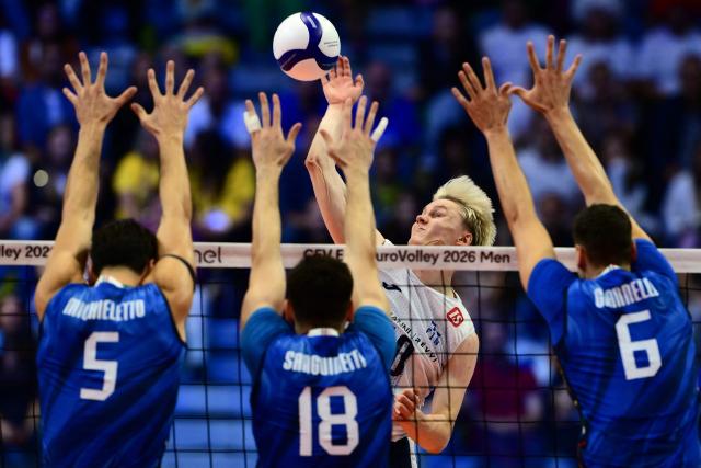 Finland’s Luka Marttila spikes the ball during the CEV EuroVolley 2026 men's quarterfinal volleyball match between Italy and Finland at the Palavela in Turin on September 23, 2026. (Photo by Marco BERTORELLO / AFP)