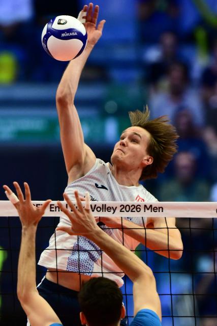 Finland’s Petteri Tyynismaa spikes the ball during the CEV EuroVolley 2026 men's quarterfinal volleyball match between Italy and Finland at the Palavela in Turin on September 23, 2026. (Photo by Marco BERTORELLO / AFP)