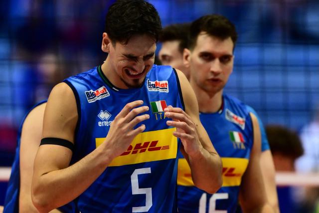 Italy’s Alessandro Michieletto reacts during the CEV EuroVolley 2026 men's quarterfinal volleyball match between Italy and Finland at the Palavela in Turin on September 23, 2026. (Photo by Marco BERTORELLO / AFP)