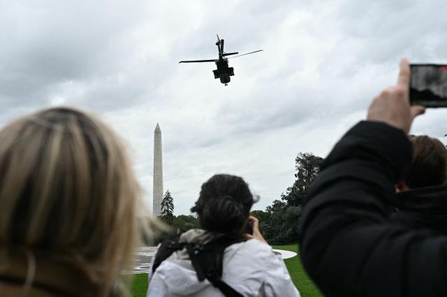 US President Donald Trump and First Lady Melania Trump on board Marine One depart from the South Lawn of the White House in Washington, DC, on September 23, 2026. The Trumps are heading to Joint Base Andrews to greet Chinese President Xi Jinping. (Photo by Alex WROBLEWSKI / AFP)