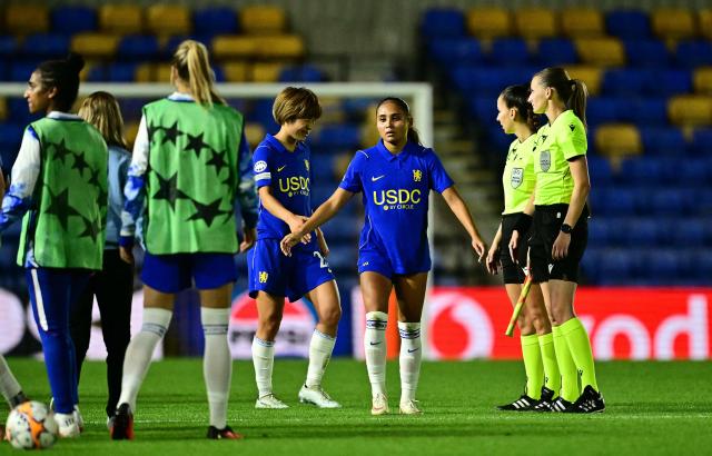 Chelsea's Japanese striker #23 Maika Hamano and Chelsea's US midfielder #12 Alyssa Thompson react after the UEFA Women's Champions League football match between Chelsea and Austria Wien at the Cherry Red Records Stadium in Wimbledon, south-west London on September 23, 2026. (Photo by Ben STANSALL / AFP)