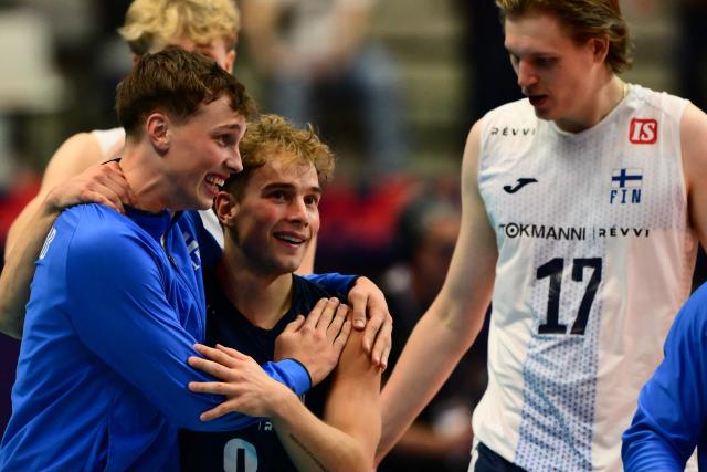 Finland’s Voitto Koykka celebrates with teammates after winning the CEV EuroVolley 2026 men's quarterfinal volleyball match between Italy and Finland at the Palavela in Turin on September 23, 2026. (Photo by Marco BERTORELLO / AFP)