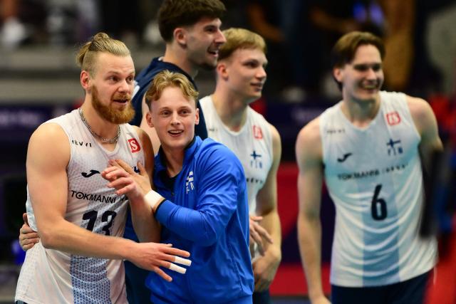 Finland’s Joonas Jokela celebrates with teammates after winning the CEV EuroVolley 2026 men's quarterfinal volleyball match between Italy and Finland at the Palavela in Turin on September 23, 2026. (Photo by Marco BERTORELLO / AFP)
