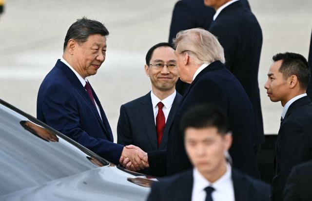 US President Donald Trump and Chinese President Xi Jinping shake hands at Joint Base Andrews in Maryland on September 23, 2026. Xi is visiting the United States from September 23 to 25. (Photo by Kent NISHIMURA / AFP)