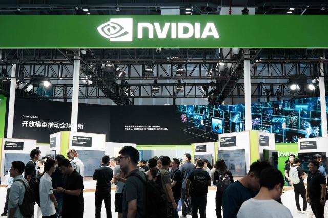People visit the booth of US chipmaker NVIDIA during the 5th Global Digital Trade Fair in Hangzhou, eastern China's Zhejiang province on September 22, 2026. (Photo by CN-STR / AFP) / China OUT