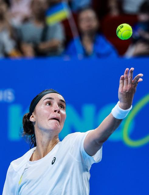 Ukraina's Anhelina Kalinina serves to Belgium's Jana Otzipka during their women's singles quarter-final match at the Billie Jean King Cup tennis tournament in Shenzhen, southern China's Guangdong province on September 24, 2026. (Photo by CN-STR / AFP) / China OUT
