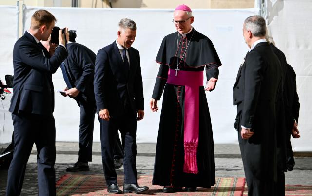 Hungarian Prime Minister Peter Magyar is welcomed by the Prefect of the Papal Household Petar Rajic as he arrives at San Damaso courtyard before a private audience with Pope Leo XIV in The Vatican on September 24, 2026. (Photo by Alberto PIZZOLI / AFP)