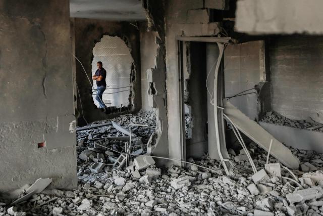 A man assesses the damage as he stands amid the rubble of the home of Palestinian prisoner Dawas Hassoun moments after it was demolished by the Israeli army in the Palestinian village of Beit Imrin, in the Israeli-occupied West Bank, on September 24, 2026. Hassoun is accused by Israeli authorities of carrying out a car-ramming attack in March 2026 that killed an Israeli settler. (Photo by Mohammad MANSOUR / AFP)