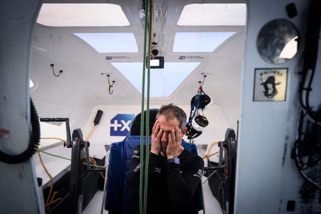 (FILES) French skipper Armel Le Cleac'h sails his Ultim multihull Banque Populaire during a training session from Bordeaux to Lorient ahead of the Route du Rhum solo transatlantic sailing race from Saint-Malo to Pointe-a-Pitre, on May 29, 2026. The water slaps against the enormous trimaran as it speeds across a glassy sea. The 12-hour, 400-km night crossing of the Bay of Biscay is just a “tiny” training exercise for Armel Le Clйac’h. Yet it is essential to his “meticulous” preparation for the upcoming Route du Rhum. On this May 20216 evening, the winner of the 2016–2017 Vendee Globe has switched into competition mode, with his sights set on November 1, the start date of the 13th edition of the Route du Rhum. (Photo by Loic VENANCE / AFP)