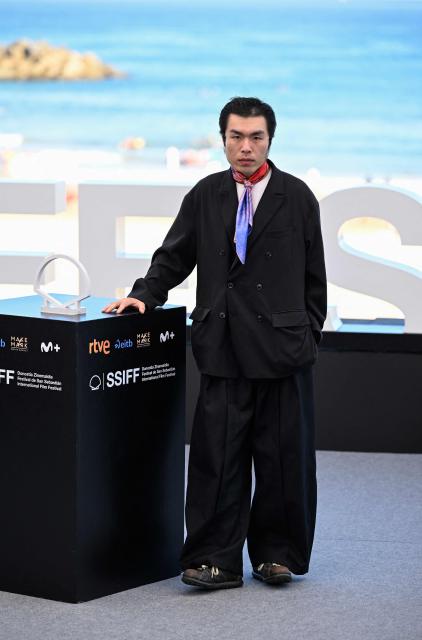 Chinese actor Zheyan Li poses during a photocall to promote the film "Bian Jing" (Border) during the 74th San Sebastian International Film Festival in the northern Spanish Basque city of San Sebastian on September 24, 2026. (Photo by ANDER GILLENEA / AFP)