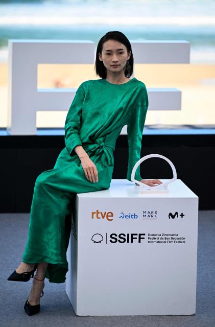 Chinese actress Feng Qin poses during a photocall to promote the film "Bian Jing" (Border) during the 74th San Sebastian International Film Festival in the northern Spanish Basque city of San Sebastian on September 24, 2026. (Photo by ANDER GILLENEA / AFP)
