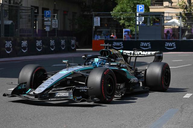 Mercedes' British driver George Russell steers his car during the first practice session ahead of the Formula One Azerbaijan Grand Prix at the Baku City Circuit in Baku on September 24, 2026. (Photo by Igor IVANKO / AFP)