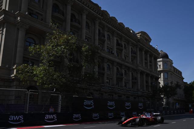 Ferrari's Monegasque driver Charles Leclerc steers his car during the first practice session ahead of the Formula One Azerbaijan Grand Prix at the Baku City Circuit in Baku on September 24, 2026. (Photo by Igor IVANKO / AFP)